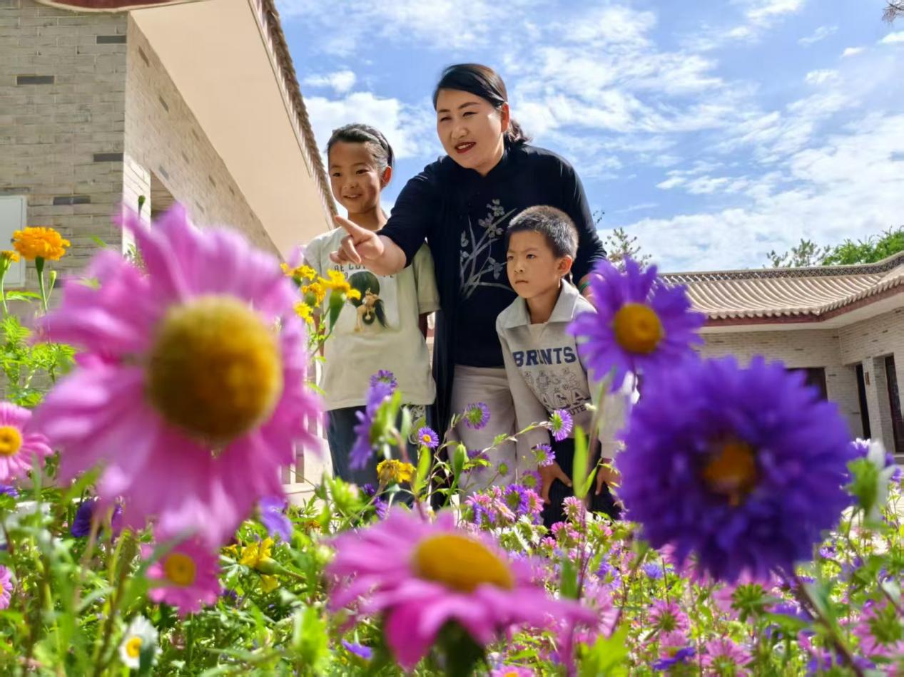 “劳模先锋·奋斗者说”系列访谈|张小燕：以爱为犁的希望耕耘者